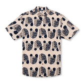 Camisa de manga corta con cuello campamento y estampado a juego